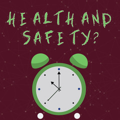 Conceptual hand writing showing Health And Safety question. Concept meaning regulations and procedures intended to prevent accident Colorful Round Analog Two Bell Alarm Desk Clock Hand photo