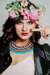 Beautiful model in flower crown. Woman spring makeup portrait