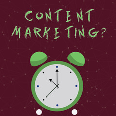 Conceptual hand writing showing Content Marketing question. Concept meaning involves creation and sharing of online material Colorful Round Analog Two Bell Alarm Desk Clock Hand photo