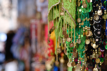 Close up view of many scarfs for a female belly dancers.