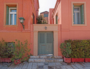 colorful saumon house front at Plaka picturesque neighbohood, Athens Greece