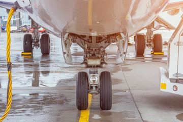 View of the front landing gear in the background rear rack chassis wheels.