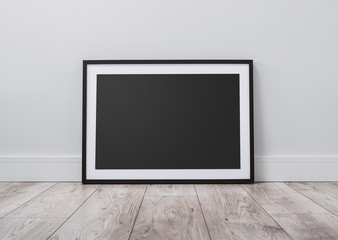 Blank picture frame on the floor with copy space and clipping path for the inside