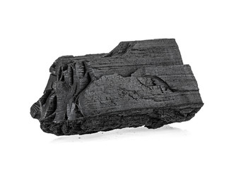 Traditional charcoal or hardwood charcoal isolated on a white background