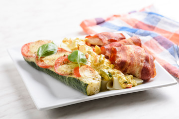 chicken breast fillet baked in bacon