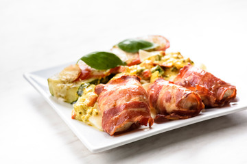 chicken breast fillet baked in bacon