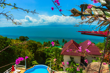 Happy holidays in beautiful beach hotel at daylight, swimming pool and relaxing