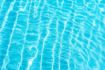 Abstract pool water surface and background with sun light reflection
