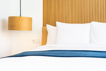 Beautiful comfortable pillow on bed decoration in bedroom