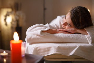 Obraz na płótnie Canvas Girl on massage in the spa salon