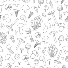 Vector seamless pattern of black and white mushrooms. Food texture in cartoon style.