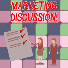 Word writing text Marketing Discussion. Business photo showcasing deliberation by company to promote the buying Man and Woman in Business Suit Presenting Report of Check and Lines on Paper