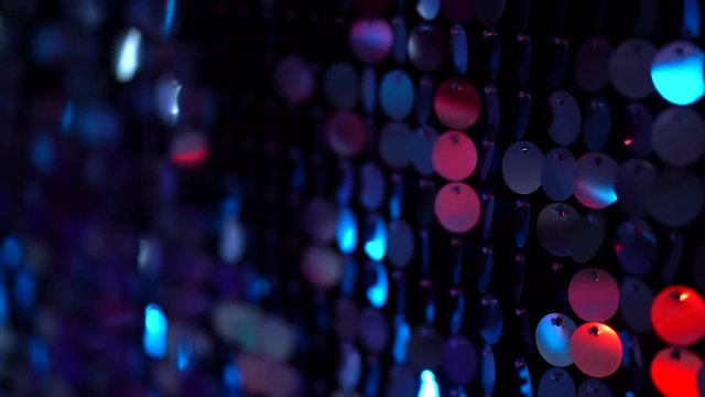 Sequins sparkling reflective background. Abstract kinetic glitter wall moving. Night club decoration. Can be used as transitions, added to modern projects,art backgrounds.