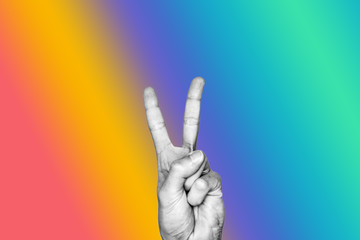 Concept of peace, pacifism, hippie, love. Hand making the two fingers peace sign. Black and white...