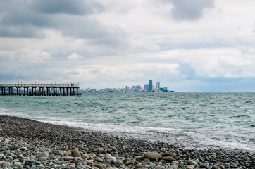 Distant city by the sea