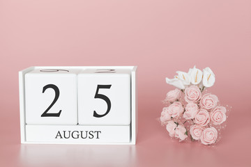 August 25th. Day 25 of month. Calendar cube on modern pink background, concept of bussines and an importent event.