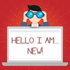 Text sign showing Hello I Am New. Business photo showcasing used as greeting or to begin telephone conversation Man Holding and Looking into Binocular Behind Open Blank Space Laptop Screen