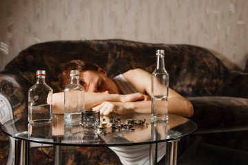 alcoholism problem. alcoholic guy. bad habit. social disease. harm to health