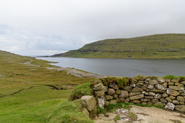 Fototapeta na wymiar An old stone house near lake Sorvagsvatn, Faroe Islands