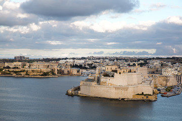 Fototapeta na wymiar Valletta old town aerial panorama view in sunset. Malta island. 