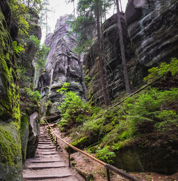 The path winding between the famous sandstone rock towers of Adrspach and Teplice Rocks. Adrspach National Park in northeastern Bohemia, Czech Republic, Europe