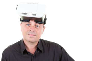 Fototapeta premium portrait casual man holding vr glasses and looking face isolated on white studio background