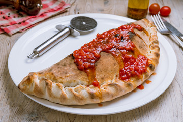Closed calzone pizza