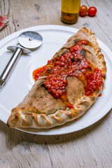 Closed calzone pizza