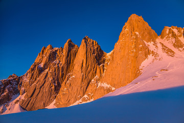 Sunrise on Mount Whitney summit skyline from Iceberg Lake