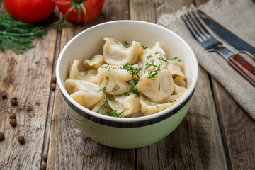 Dumplings with sour cream and herbs