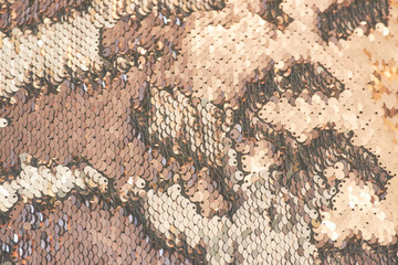 Beautiful sequin texture with divorces that looks like fish scales.