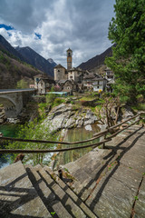 Fototapeta na wymiar Stairs with the view of Lavertezzo village, south Switzerland
