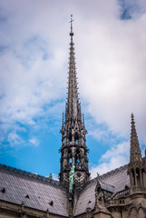 Fototapeta na wymiar Tower- Architectural details of the catholic cathedral Notre-Dame de Paris. 
