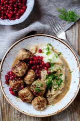 Scandinavian meatballs with mash potatoes and lingonberries