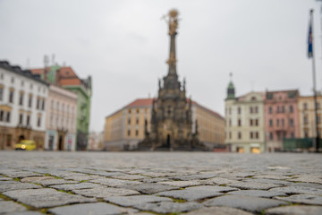 Holy Trinity Column in the main square of the old town of Olomouc, Czech Republic. Old cubes paving