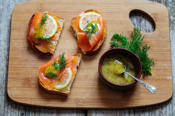 Nordic open sandwiches with salmon and mustard and dill sauce