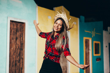 Brazilian woman wearing typical clothes for the Festa Junina - June festival