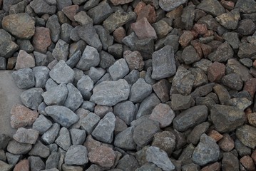 gray stone texture of fine rubble in a heap