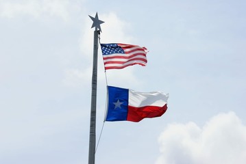 American and Texas Flag Flying