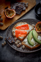 Launch with Dietary sandwiches with grain bread, cream cheese and avocado