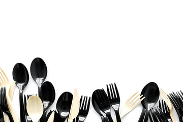 Plastic utilization concept with flatware on white background top view mock up