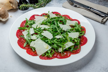 Beef carpaccio with Parmesan and arugula