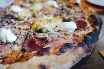 Close up on the Pizza On the table at the restaurant