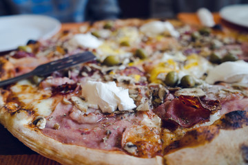Close up on the Pizza On the table at the restaurant