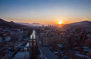 Fototapeta na wymiar Sarajevo during the sunset. Drone shot. Sarajevo city hall