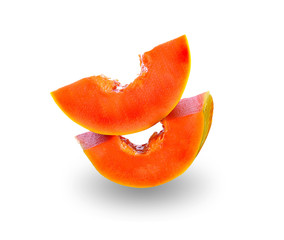 ripe papaya slices isolated on white background