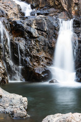 A small waterfall in a beautiful park