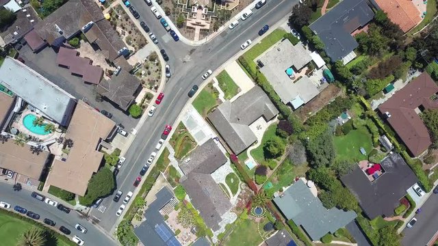 Drone Aerial Bird View of San Diego California Area Near La Jolla Beach With Roofs of Houses Swimming Pools Tennis Courts and City Car Traffic on Boulevard 4k