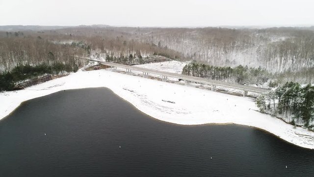 Tilt down aerial, highway by Lake Corbin