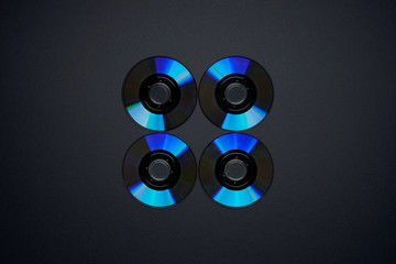 Mini dvd disc isolated on black background